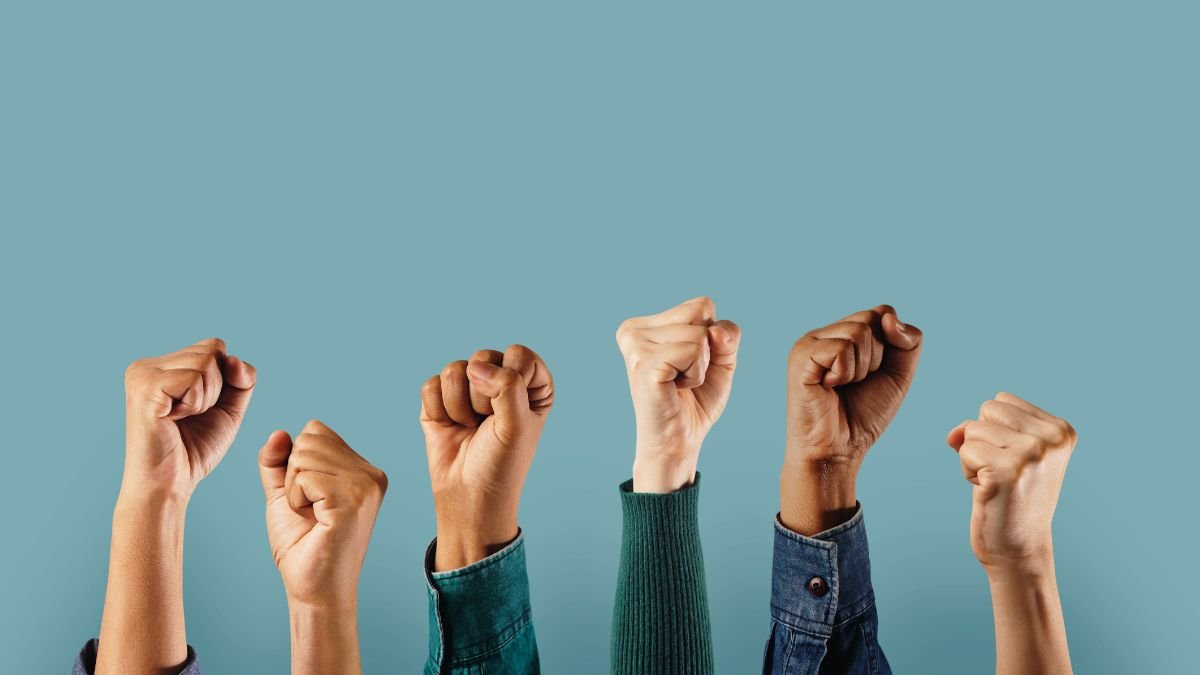 Social Activism and Movement. Group of People Raised up Hands. Concept of Aurora Juarez de Huerta en California USA